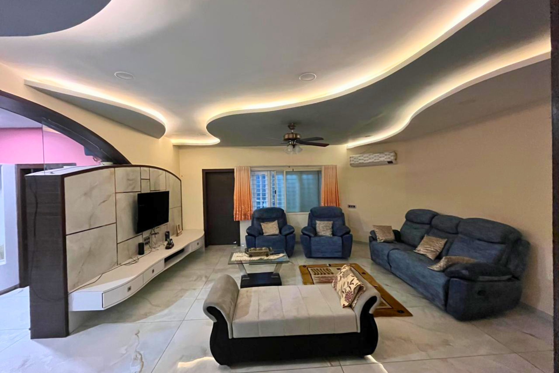 Sculpted ceiling seating area luxury interior design Ahmedabad KBEX