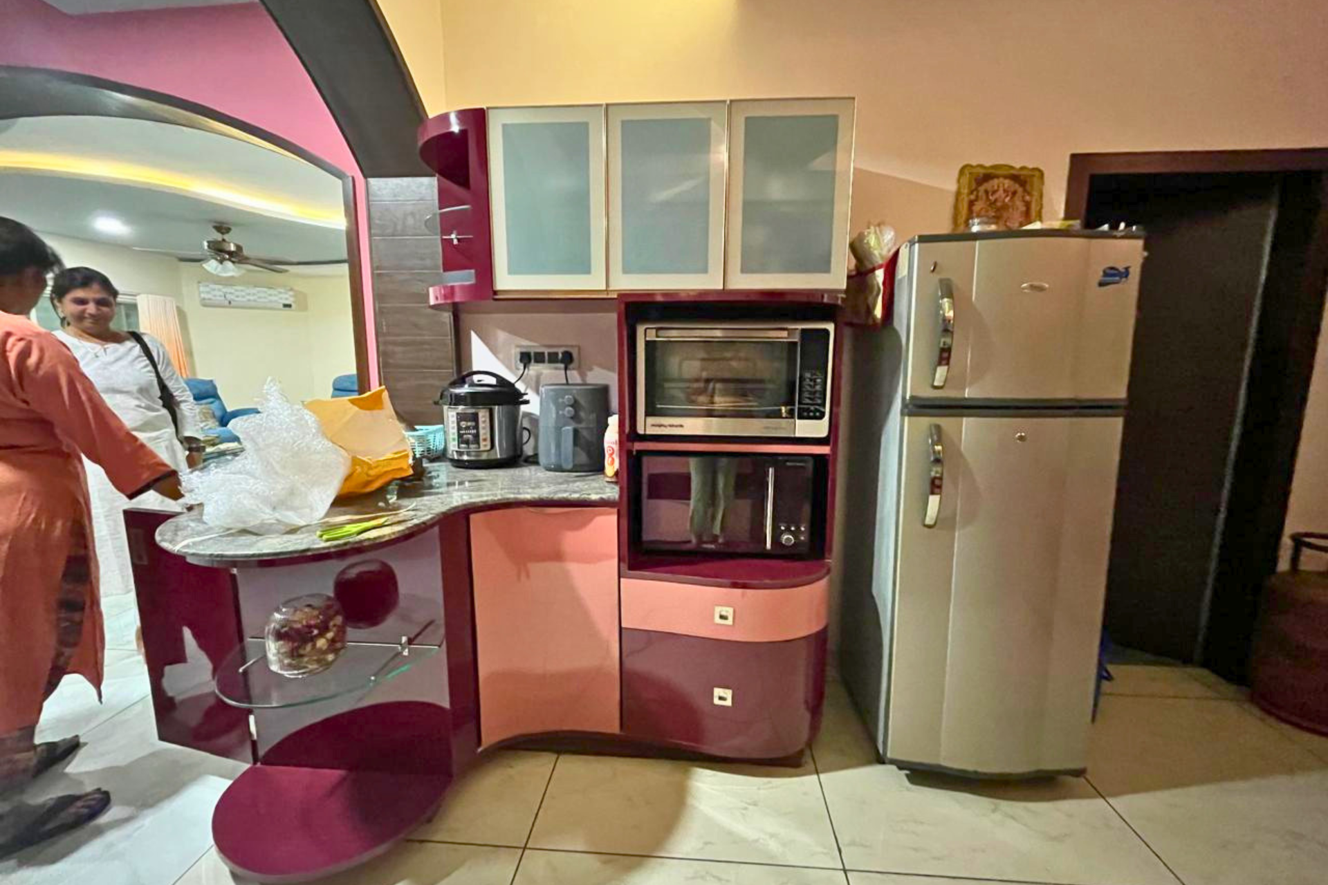 Pink modular kitchen design 4BHK residence Ahmedabad KBEX interior