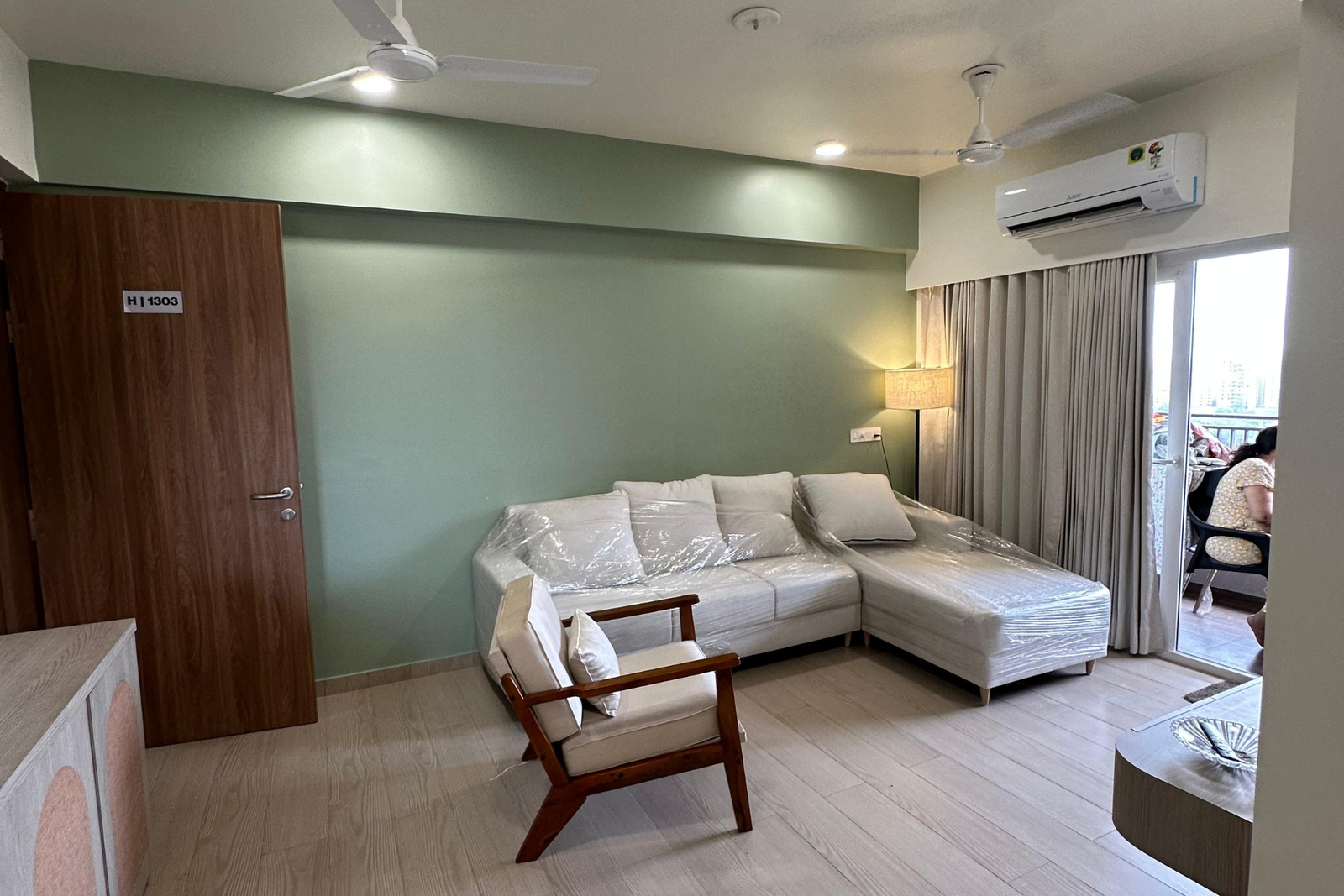 Living room seating sage wall Shela KBEX